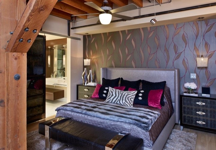 Master bedroom in a designer loft by Carla's A Classic Design